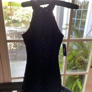 Woman’s black lace dress